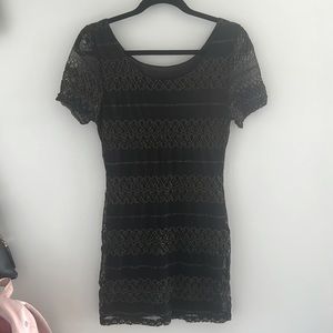 New Year’s Eve little black with gold trim short-sleeve dress